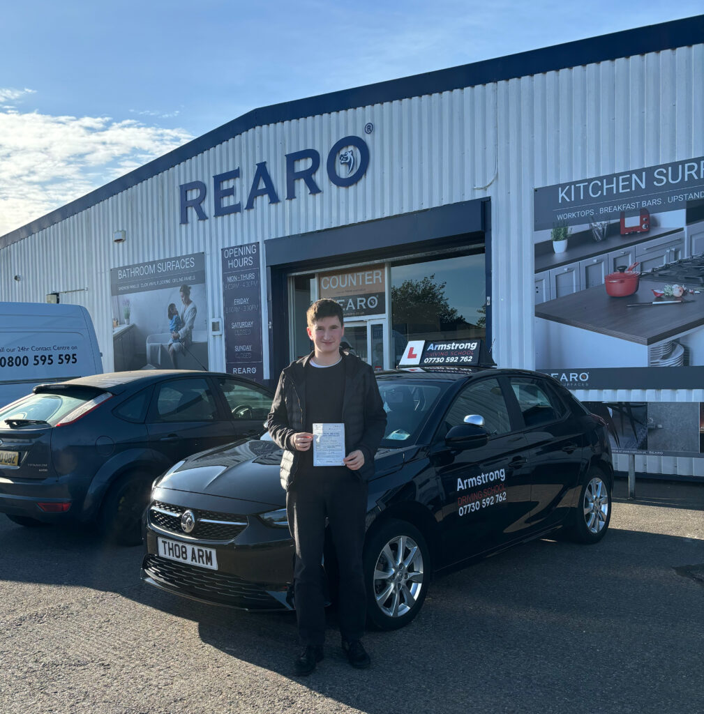 Sam Mercer passed his Driving Test
Sam Mercer, Standing outside Glasgow HQ with his certificate